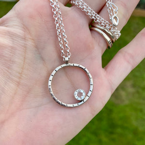 Round sterling silver and white topaz pendant necklace