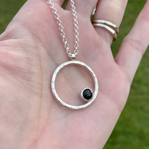 Round sterling silver and black onyx pendant necklace