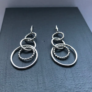 Intertwined sterling silver dandle earrings