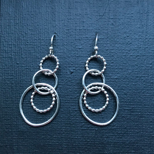 Intertwined sterling silver dandle earrings